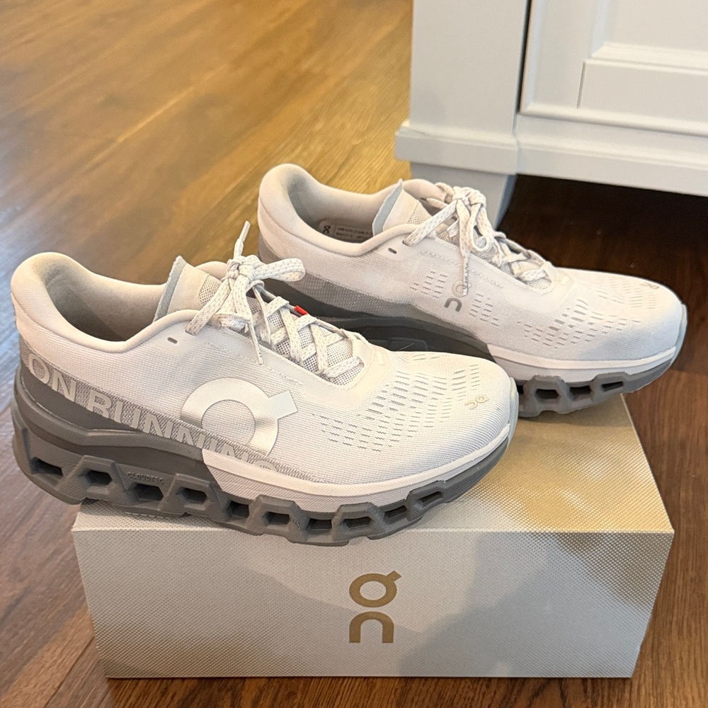 On Running Athletic Shoes in White and Gray